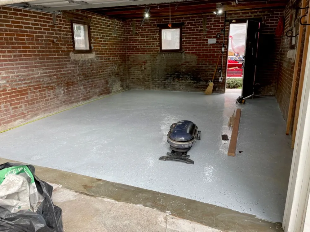 Commercial concrete floor prepped and vacuumed ahead of coating